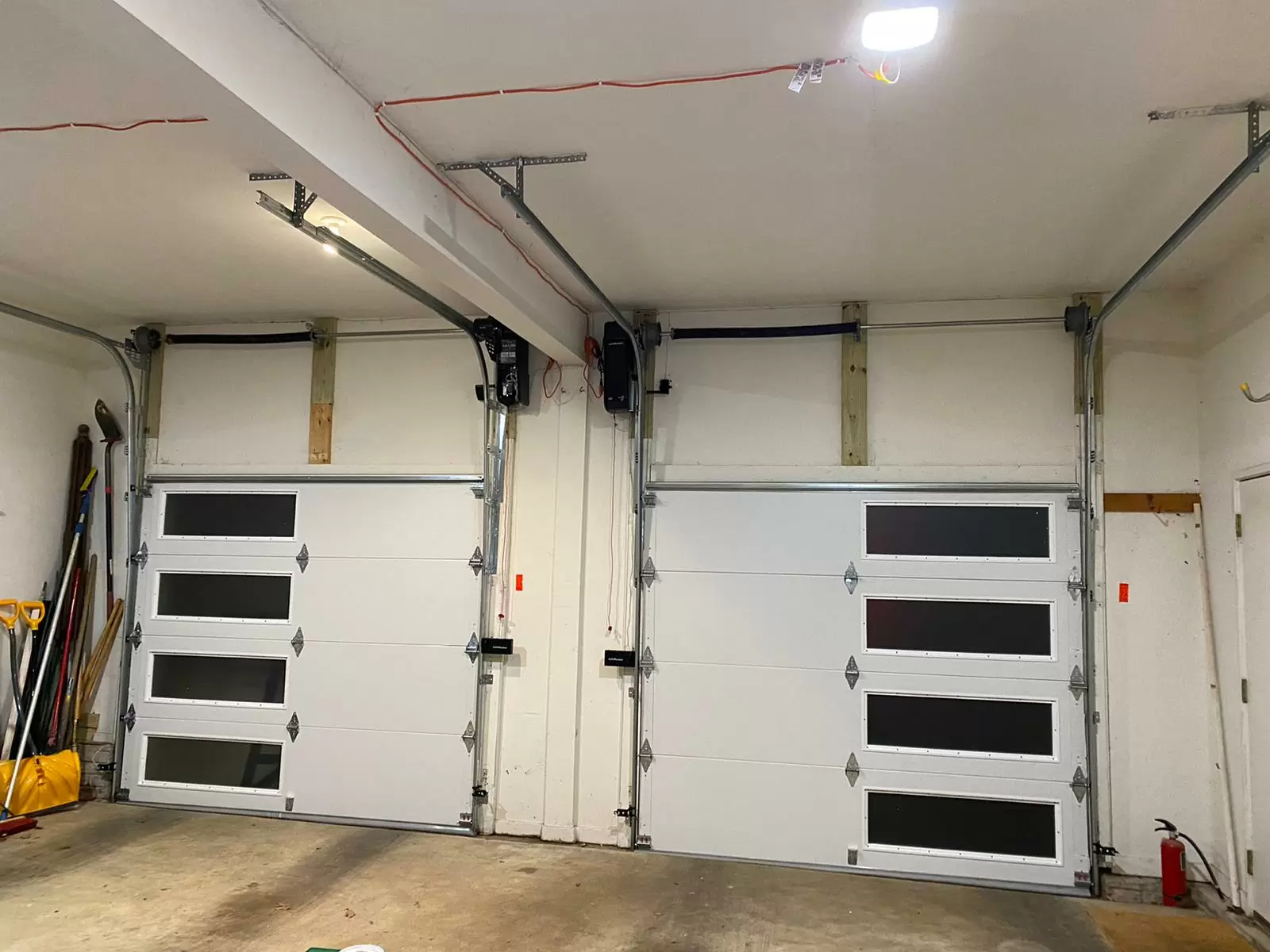 What's the cost of converting a manual garage door into an automatic one? 2