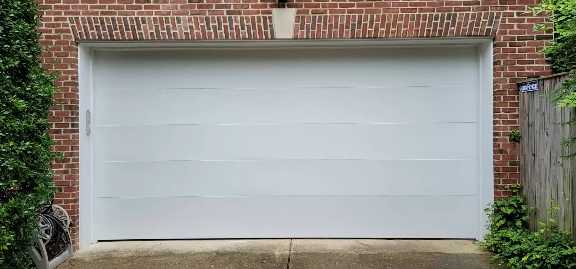 ¿Cuánto cuesta hacer que una puerta manual de garaje sea automática?